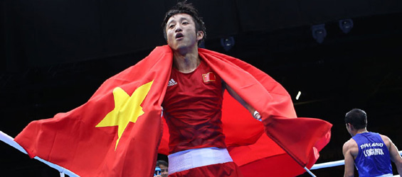 Zou Shiming defeats Thai boxer to win men's boxing 49kg gold