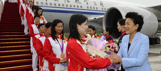 Chinese athletes return from London