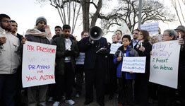 U.S. supporters of gun control pay respect for shooting victims