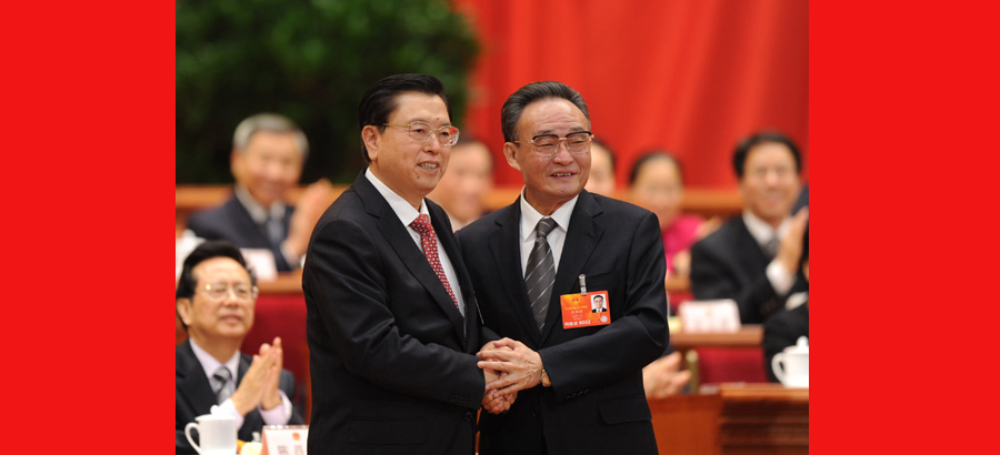 Wu Bangguo, Zhang Dejiang shake hands