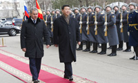 Xi hopes China, Russia to boost military ties