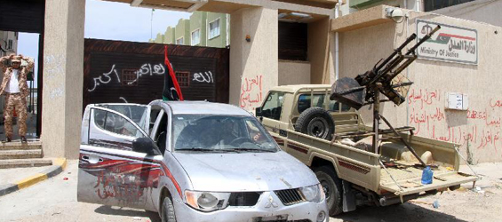 Libyan gunmen block streets after political isolation law passed