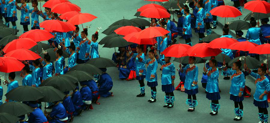 People celebrate Sama Festival in Rongjiang, China's Guizhou