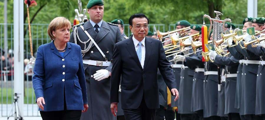 Chinese premier attends welcoming ceremony held by German chancellor