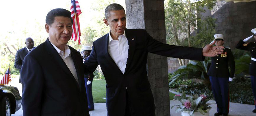 In pictures: Xi, Obama meet for 1st summit