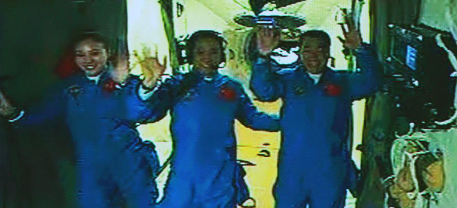 Astronauts of Shenzhou-10 spacecraft enter Tiangong-1 space module