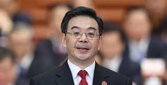 China's chief justice warns of weakness, pledges reform in court system