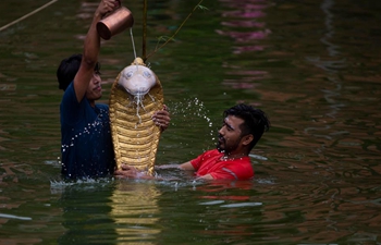 Nepalese perform ritual to mark Nag Panchami
