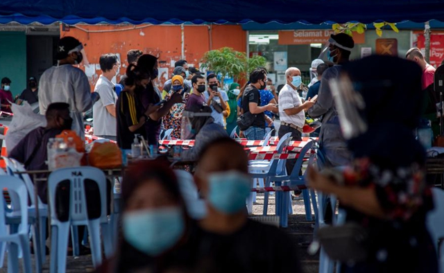 Malaysia reports 20,670 new COVID-19 cases, deaths pass 12,000 mark