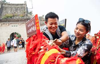 People celebrate Qixi Festival across China