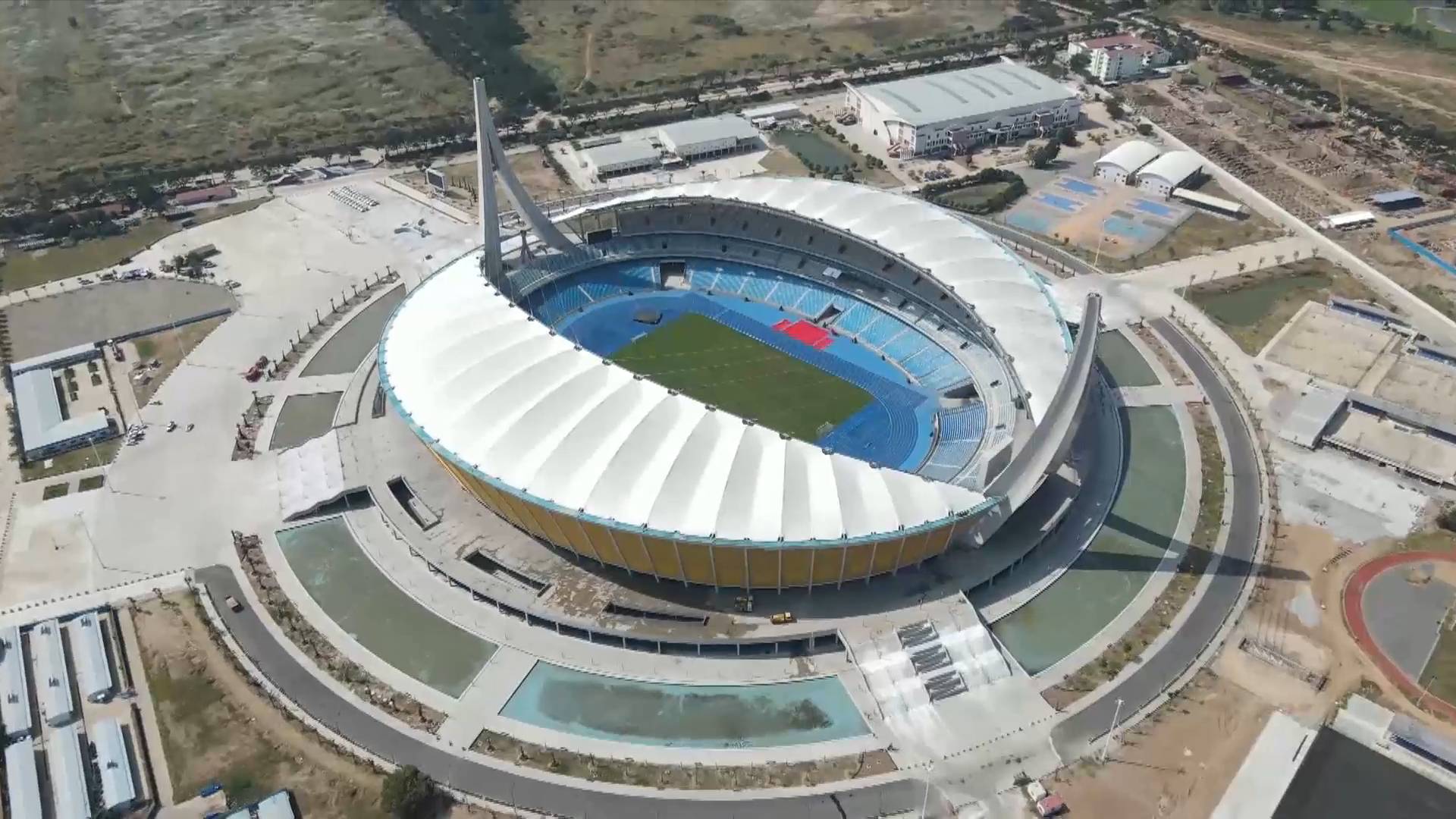 GLOBALink | Cambodia inaugurates China-aided stadium with sports parade, martial arts, dances