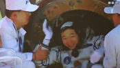 In pictures: Astronauts come out of re-entry capsule of Shenzhou-9