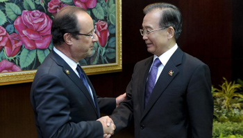 Premier Wen meets French President in Vientiane