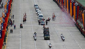 Venezuela's late President Chavez makes final journey