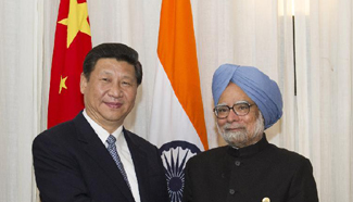 Chinese President Xi meets with Indian PM Singh in Durban