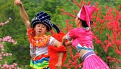 Zhuang ethnic group people stage performance for tourists in SW China