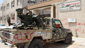 Libyan gunmen block streets after political isolation law passed