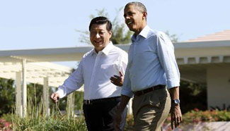 Xi, Obama take walk before heading into second meeting