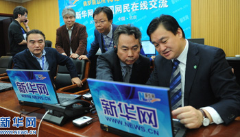 Xinhua reporters cover online interview of Russian PM