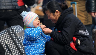 China's railway system witnesses post-holiday travel rush