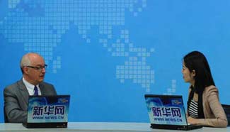 SMU president's visit to Xinhuanet headquarter