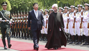 China, Iran pledge to boost ties