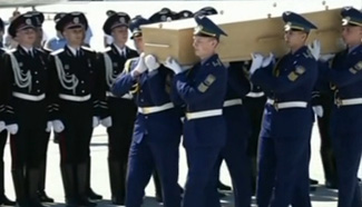 First bodies of MH17 crash arrive in Netherlands