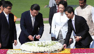 Chinese president and his wife lay wreath to memorial of Mahatma Gandhi in India