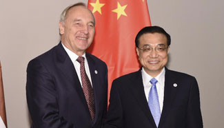 Chinese premier meets Latvia's president in Milan