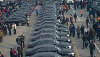 China's first impounded gov't vehicle auction fetches 1 mln USD