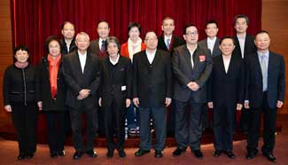 NPC deputies, CPPCC members from Macao take group photo before leaving for Beijing