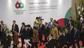 Participants enter conference hall of Asian-African Summit