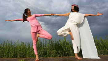 People practice yoga at Zhangye wetland reserve in NW China