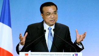 Premier Li addresses closing ceremony for business summit in SW France