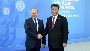 Putin expects Chinese firms to make "significant contribution" to Russia's Siberia, 
Far East