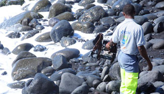Hunt for more MH370 debris to continue one week off Reunion island