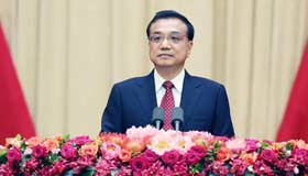 Premier Li speaks at reception for National Day