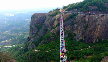 Visitors capped at first glass bridge