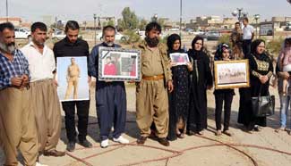 Rally held in Iraq demanding Kurds to fight against IS militants