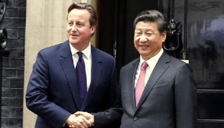 Chinese, British leaders discuss deeper cooperation