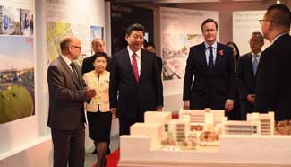 Xi tours Manchester on last day of visit