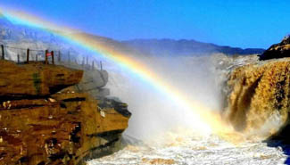 Amazing view of rainbow upon Hukou Falls of Yellow River
