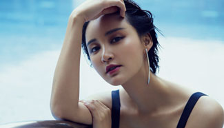 Actress Zhang Xinyi poses for fashion shots