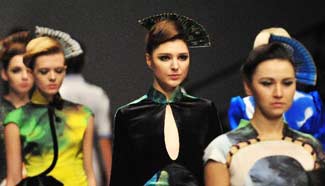 Models display creations at China Fashion Week