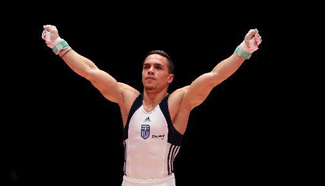 Petrounias wins men's rings final at gymnastics worlds