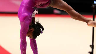 Simone Biles wins women's balance beam final at gymnastics worlds