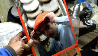 Traditional caps workshop seen in Pakistan