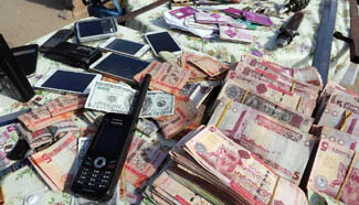 Arrested migrants seen at coast guard compound in Libya