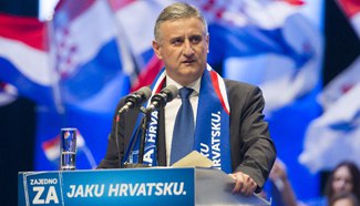 Croatia's pre-election poll shows two largest coalitions neck-and-neck