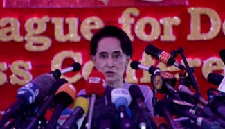 Myanmar's opposition leader promises to govern behind the scenes